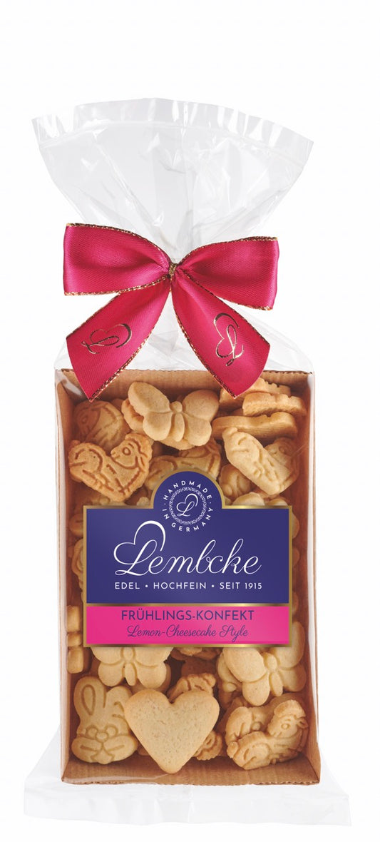 Frühlings-Konfekt Lemon Cheesecake Style – zartes Mini-Mürbegebäck mit frischer Zitronennote, erhältlich in der Dreyer Confiserie in der Rattenfängerstadt Hameln.