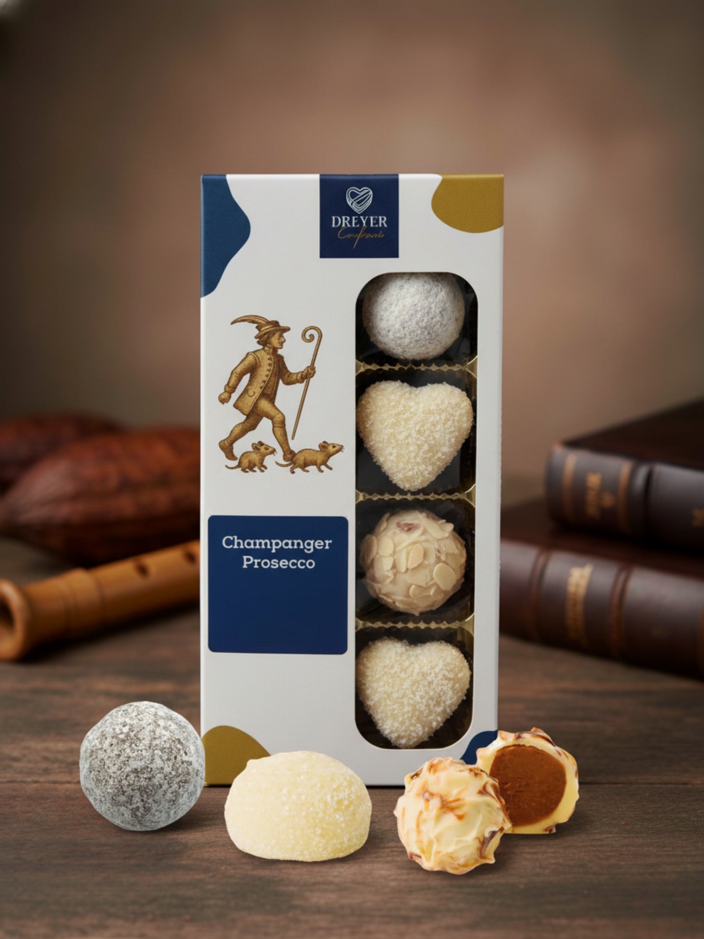 Dreyer Confiserie Champagner-Prosecco Pralinen 95g: Auswahl aus 8 alkoholhaltigen Pralinen mit Champagner- und Prosecco-Note, hergestellt von Wagner Pralinen für die Dreyer Confiserie aus der Rattenfängerstadt Hameln.