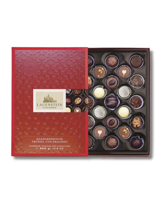 Lauensteiner Trüffel- und Pralinen-Auslese 300 g – elegante Mischung mit Klassikern wie Eierlikör-Trüffel, Marc de Champagne, Kokos-Edelmarzipan-Praline und Salz-Butter-Karamell, erhältlich in der Dreyer Confiserie in der Rattenfängerstadt Hameln.