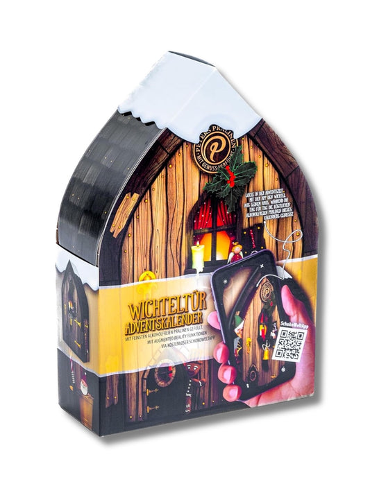 Vorderseite des Adventskalenders „Das Haus des Weihnachtswichtels“ 300 g von PETERS – alkoholfreier Pralinen-Adventskalender mit Augmented-Reality-Funktion, erhältlich in der Dreyer Confiserie in Hameln.