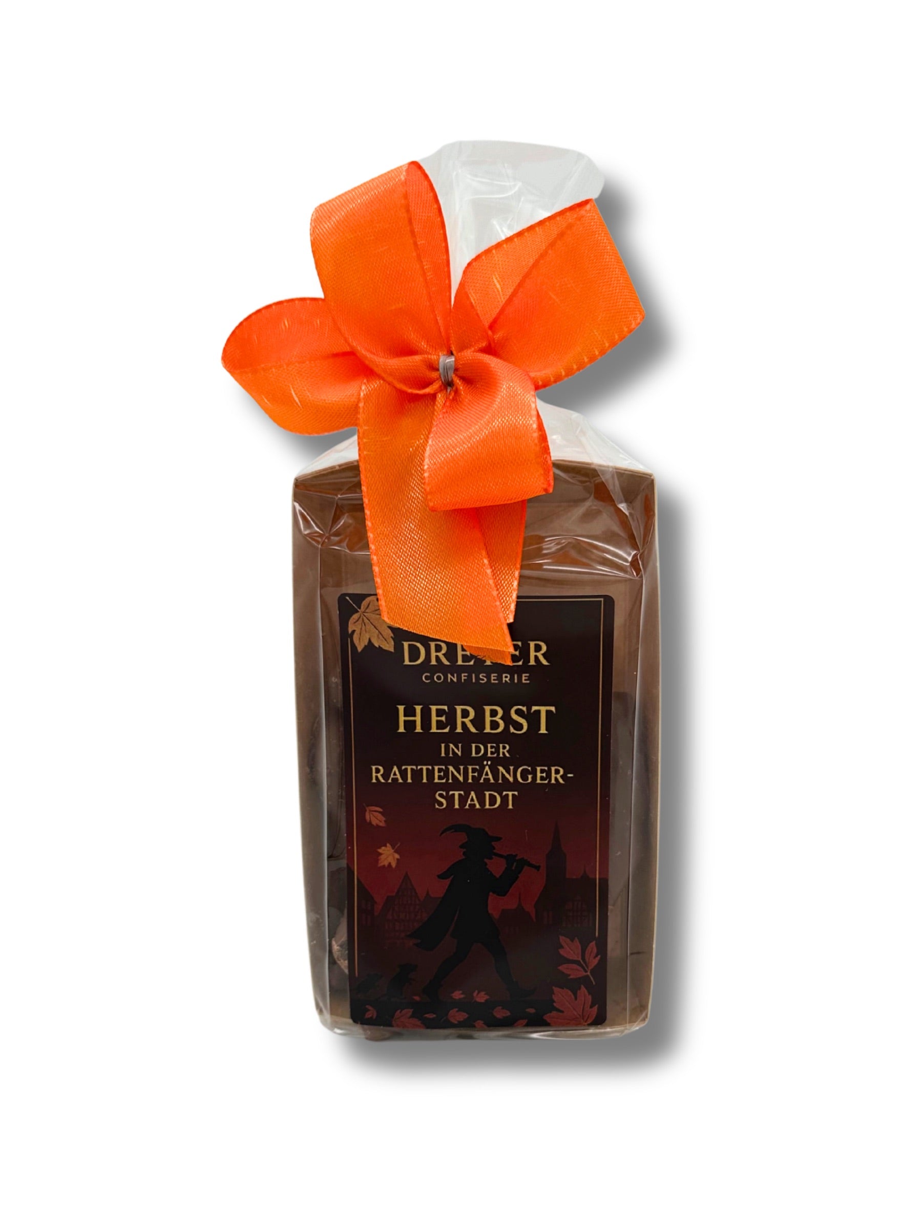 Mangostreifen in Vollmilchschokolade 100 g von Dreyer Confiserie – getrocknete Mango umhüllt mit cremiger Vollmilchschokolade.