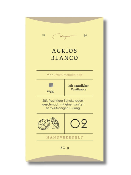 Wagner Manufakturschokolade Agrios Blanco – weiße Schokolade mit fruchtiger Zitrusfüllung, handgeschöpft, erhältlich in der Dreyer Confiserie in der Rattenfängerstadt Hameln.