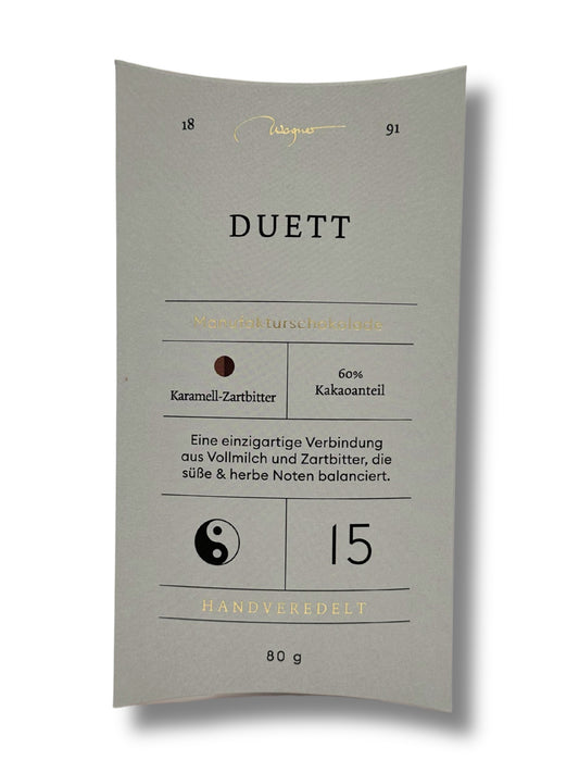 Wagner Manufakturschokolade Duett – Karamell-Zartbitterschokolade mit 60 % Kakao, handgeschöpft, erhältlich in der Dreyer Confiserie in der Rattenfängerstadt Hameln.