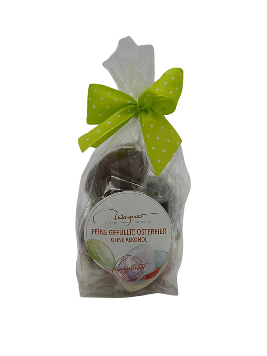 Bunte Pralinen-Eier-Mischung von Wagner Manufaktur aus Zartbitter-, Vollmilch- und weißer Schokolade, erhältlich bei der Confiserie Dreyer in Hameln – alkoholfrei und handgefertigt.