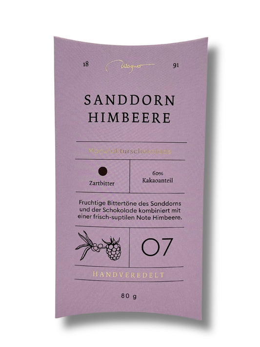 Wagner Manufakturschokolade Sanddorn Himbeere – Zartbitterschokolade mit fruchtigem Sanddorn und Himbeere, handgeschöpft, erhältlich in der Dreyer Confiserie in der Rattenfängerstadt Hameln.