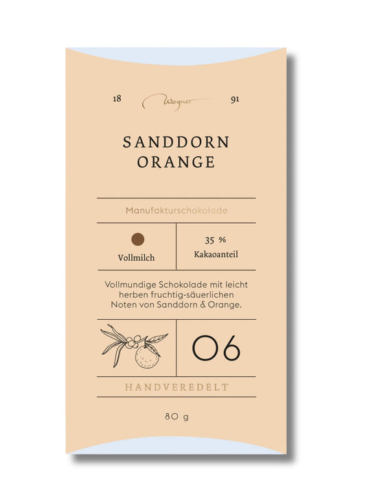 Wagner Manufakturschokolade Sanddorn Orange – Vollmilchschokolade mit fruchtigen Noten von Sanddorn und Orange, handgeschöpft, erhältlich in der Dreyer Confiserie in der Rattenfängerstadt Hameln.