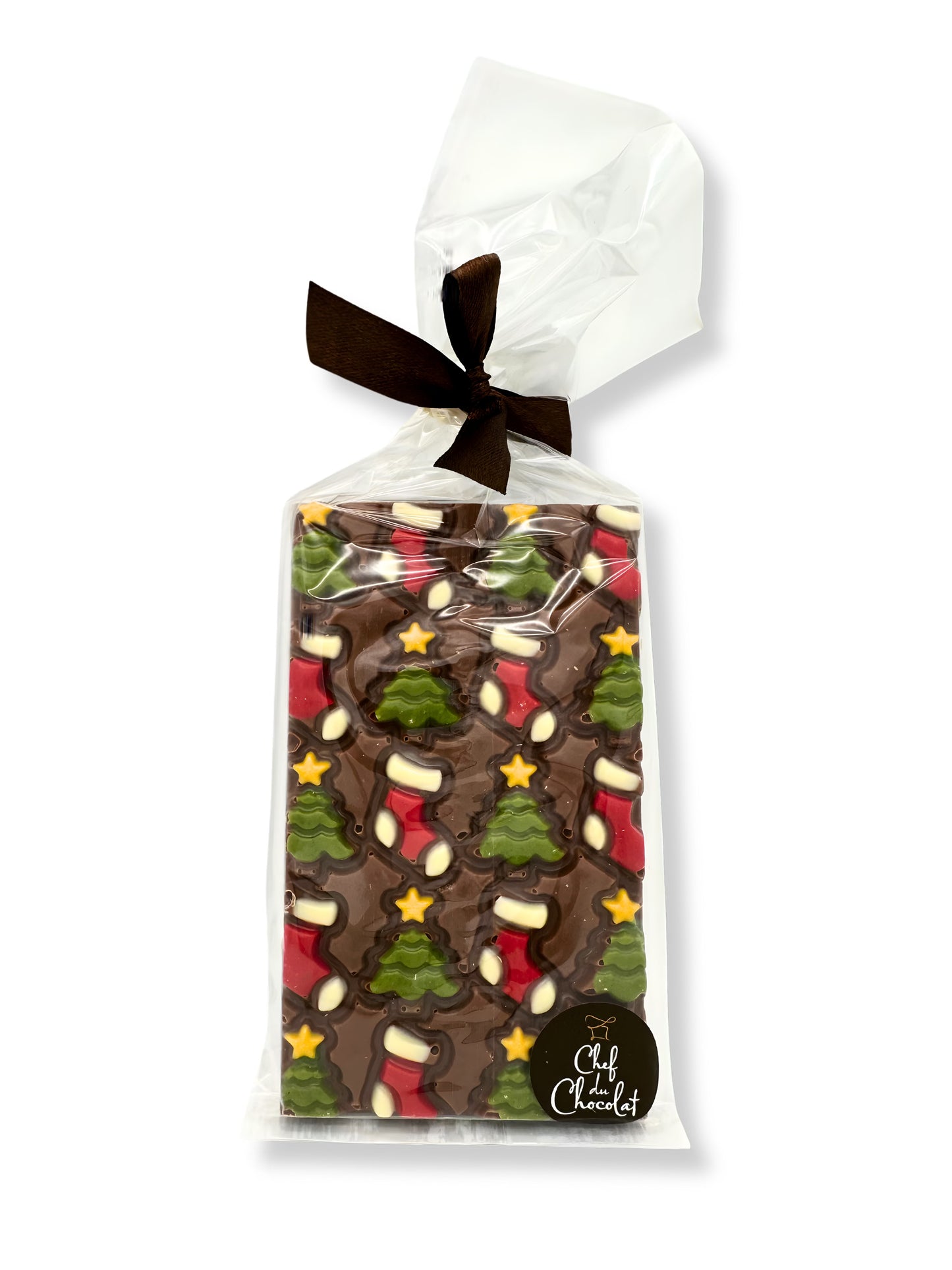 Weihnachten Schokoladentafel Vollmilch 150g von der von Ham Chocolaterie – weihnachtlich dekorierte Vollmilchschokoladentafel mit Baum-, Stern- und Stiefelmotiven, erhältlich in der Dreyer Confiserie in der Rattenfängerstadt Hameln.