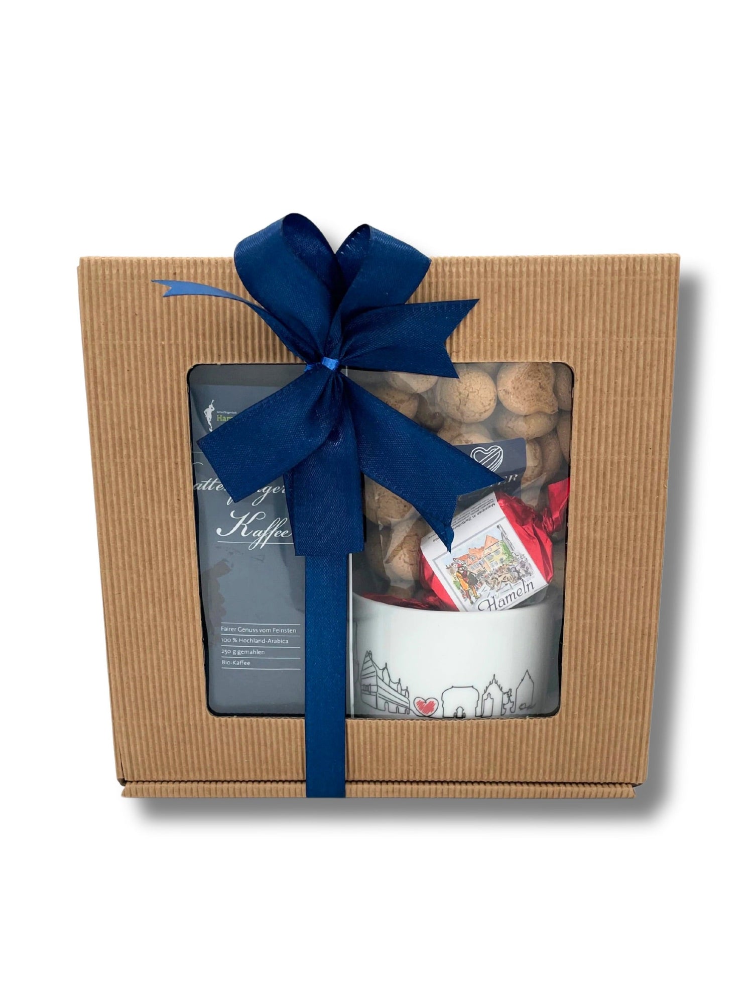 „Stilvoll verpackte Präsente mit Pralinen, Schokolade und Marzipan aus der Dreyer Confiserie Zuhause in der Rattenfänger Stadt Hameln – perfekt als Geschenkidee für Genießer“