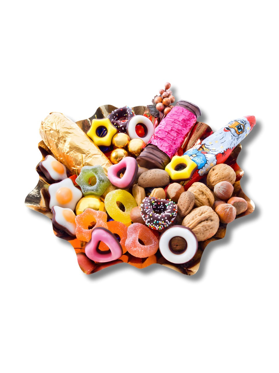 Bunter Teller mit Weihnachts-Süßigkeiten – Geleesterne, Fondantsterne, Schokotaler, Mini-Pralinen und Figuren von Dreyer Confiserie Hameln.