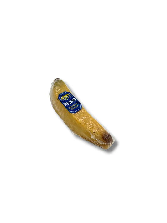 Banane Marzipan 50g – Edelmarzipan in Bananenform, gefertigt von der Odenwälder Marzipan Konditorei, erhältlich in der Dreyer Confiserie in der Rattenfängerstadt Hameln.