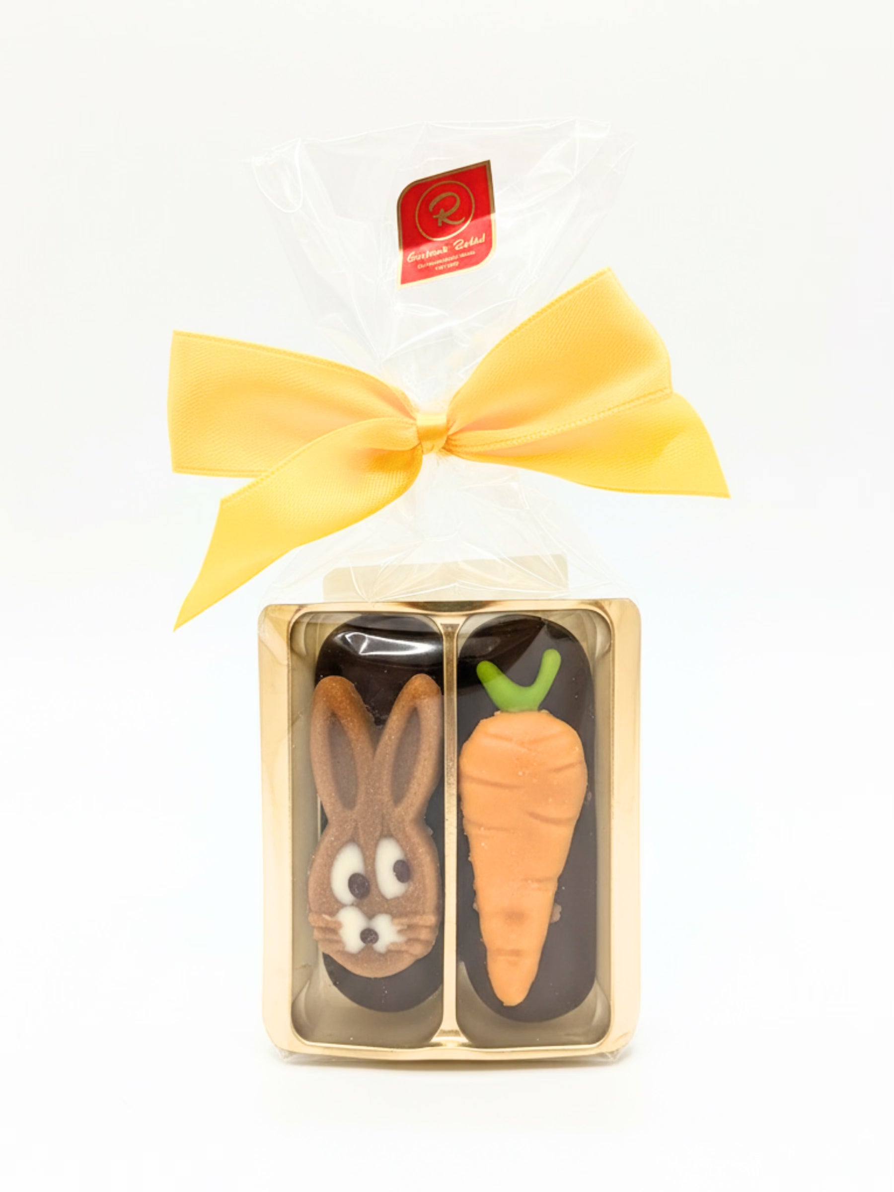Confiserie Rabbel Marzipan-Nougat-Röllchen 60g mit Hasenkopf und Möhre zu Ostern bei Dreyer Confiserie Hameln