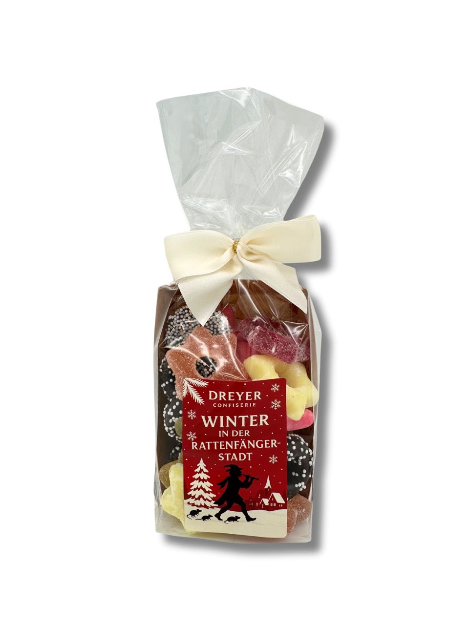 Kringelmischung 250 g mit Aufdruck „Winter in der Rattenfängerstadt“, bunte Mischung aus Geleesternen, Fondantringen und Schokoladenkringeln, erhältlich in der Dreyer Confiserie in der Rattenfängerstadt Hameln.