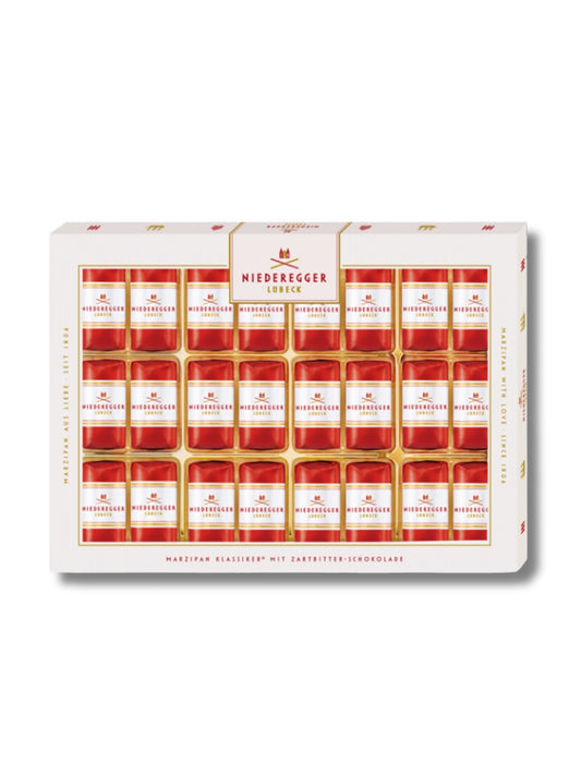 Niederegger Marzipan Klassiker 300 g – 24 Pralinen mit feiner Marzipanfüllung in edler Zartbitter-Schokolade, große Genießerpackung, erhältlich in der Dreyer Confiserie in der Rattenfängerstadt Hameln.