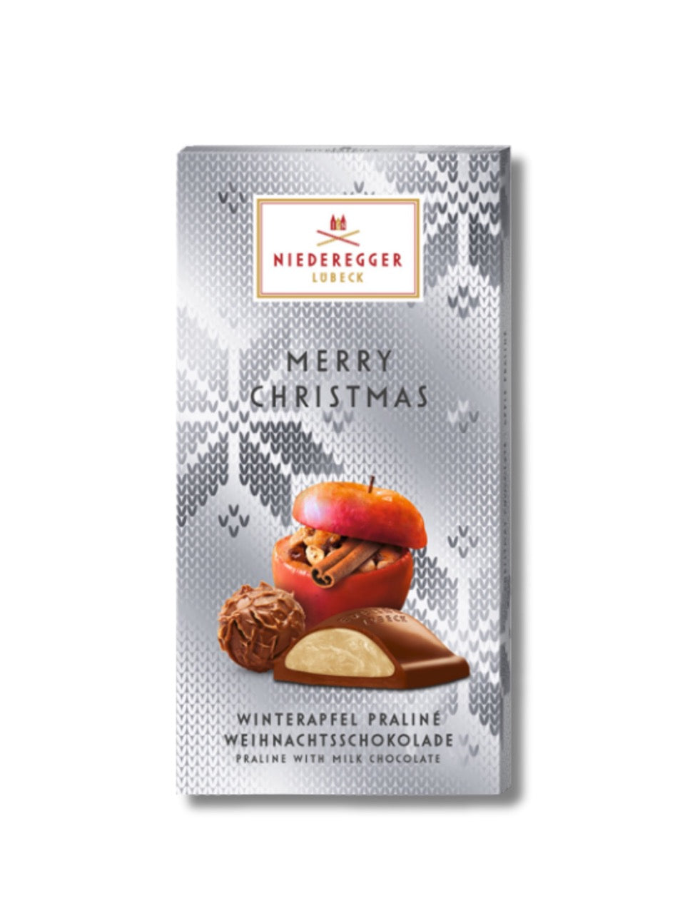 Niederegger Praliné Tafel-Schokolade „Merry Christmas“ Winterapfel 100 g – Vollmilchschokolade mit fruchtiger Apfel-Zimt-Praliné-Füllung, festliche Spezialität, erhältlich in der Dreyer Confiserie in der Rattenfängerstadt Hameln.