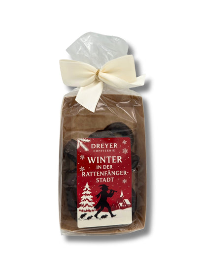 Rotweinringe 100 g mit Aufdruck „Winter in der Rattenfängerstadt“, handverpackte Pralinen mit Rotweinfüllung, erhältlich in der Dreyer Confiserie in der Rattenfängerstadt Hameln.