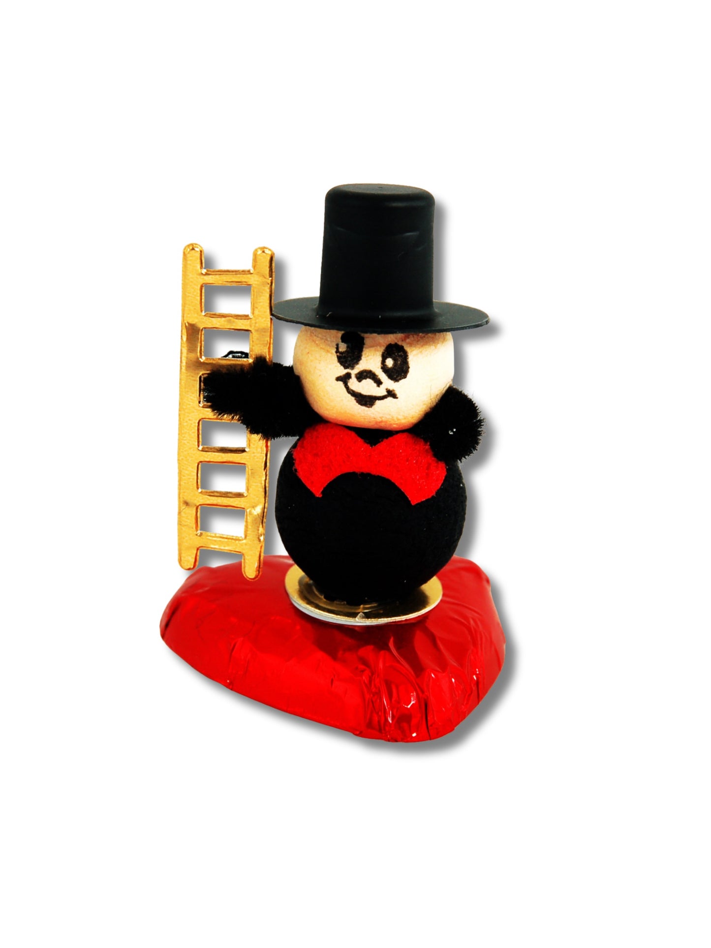 Storz Schornsteinfeger auf Herz 9 g – Glücksbringer-Figur aus Vollmilchschokolade auf rotem Herz, ideal für den bunten Teller und erhältlich in der Dreyer Confiserie in der Rattenfängerstadt Hameln.