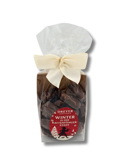 Weihnachtliche Lebkuchen Zartbitter 130 g – festliches Lebkuchengebäck in Geschenkverpackung „Winter in der Rattenfängerstadt“, erhältlich in der Dreyer Confiserie in Hameln.