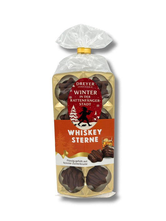 Whisky Sterne 100 g – Pralinen mit flüssiger Whisky-Füllung in Vollmilchschokolade, mit Bitterschokoladen-Dekor, erhältlich in der Dreyer Confiserie in der Rattenfängerstadt Hameln.