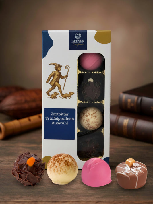Dreyer Confiserie Trüffelvariationen 100g. Mischung aus 8 hochwertigen Trüffelpralinen mit & ohne Alkohol, Rattenfänger Design hergestellt von Wagner Pralinen für die Dreyer Confiserie Hameln.