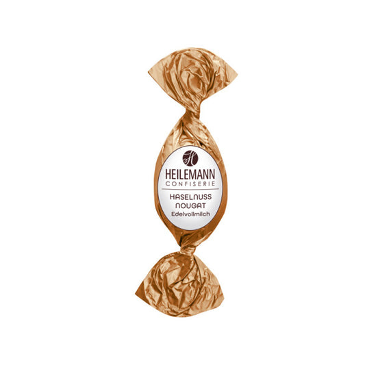 Heilemann Haselnuss-Nougat-Osterei – Edelvollmilchschokolade mit feiner Haselnuss-Nougat-Füllung, ideal fürs Osternest, erhältlich in der Confiserie Dreyer in der Rattenfängerstadt Hameln.

