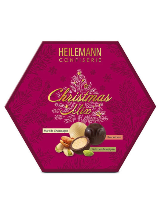 Heilemann Christmas Mix mit Trüffel-Kugeln 180 g – edle Geschenkverpackung mit gefüllten Trüffel-Kugeln in den Sorten Marc de Champagne, Knickebein und Pistazien-Marzipan, erhältlich in der Dreyer Confiserie in der Rattenfängerstadt Hameln.