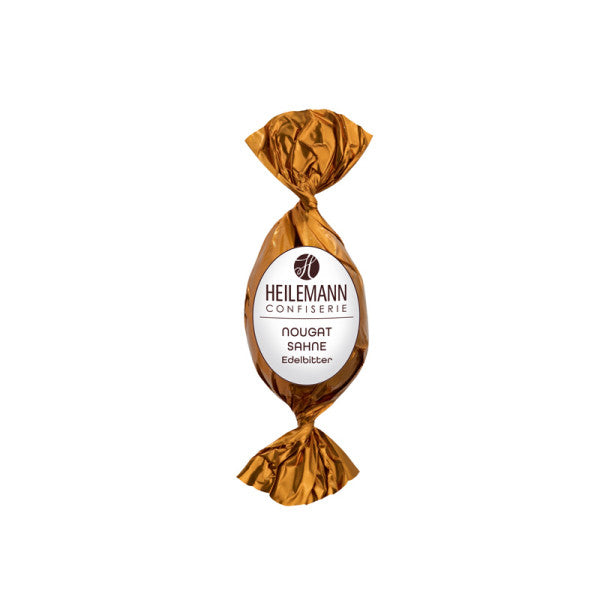 Heilemann Nougat-Sahne-Osterei – Edelbitterschokolade mit zartschmelzender Nougat-Sahne-Füllung, perfekt zum Verschenken oder Dekorieren, erhältlich in der Confiserie Dreyer in der Rattenfängerstadt Hameln.