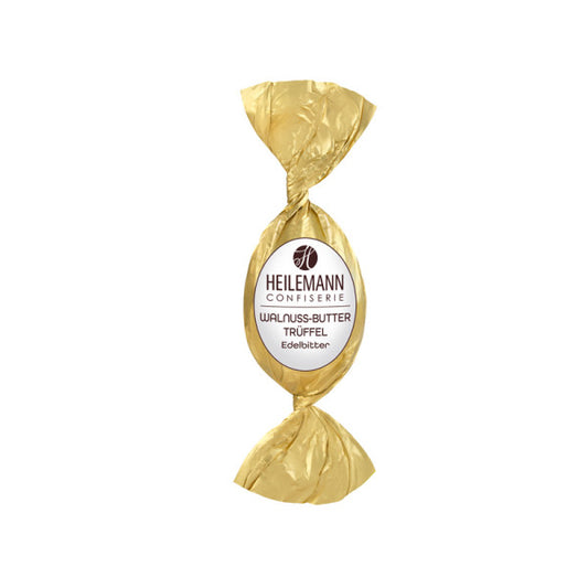 Heilemann Walnuss-Butter-Trüffel-Osterei – Edelbitterschokolade mit cremiger Walnussfüllung und feiner Rumnote, erhältlich in der Confiserie Dreyer in der Rattenfängerstadt Hameln.