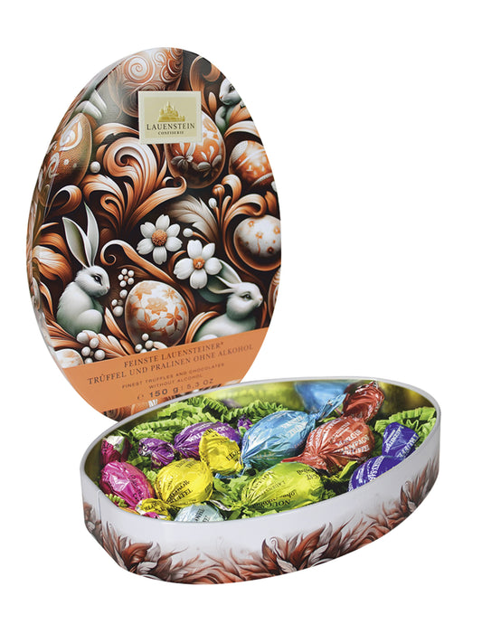 Osterei Dose Gourmet Eier bunt gewickelt 150g von der Lauenstein Confiserie, sechsfach sortierte Pralinen und Trüffel Eier ohne Alkohol in dekorativer Metalldose, erhältlich bei der Dreyer Confiserie in Hameln.