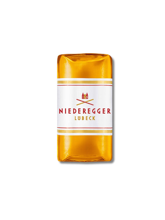 Niederegger Marzipan Klassiker Ananas 12,5 g – Praline aus Lübecker Marzipan mit exotischer Ananasnote und Vollmilchschokoladenüberzug, erhältlich bei Dreyer Confiserie Hameln.