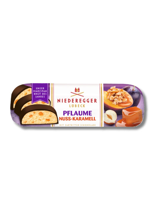 Niederegger Brot des Jahres 2025 Pflaume-Nuss-Karamell 125 g – Marzipanbrot mit Haselnüssen, Karamell und Pflaume in Zartbitterschokolade, erhältlich bei Dreyer Confiserie Hameln.