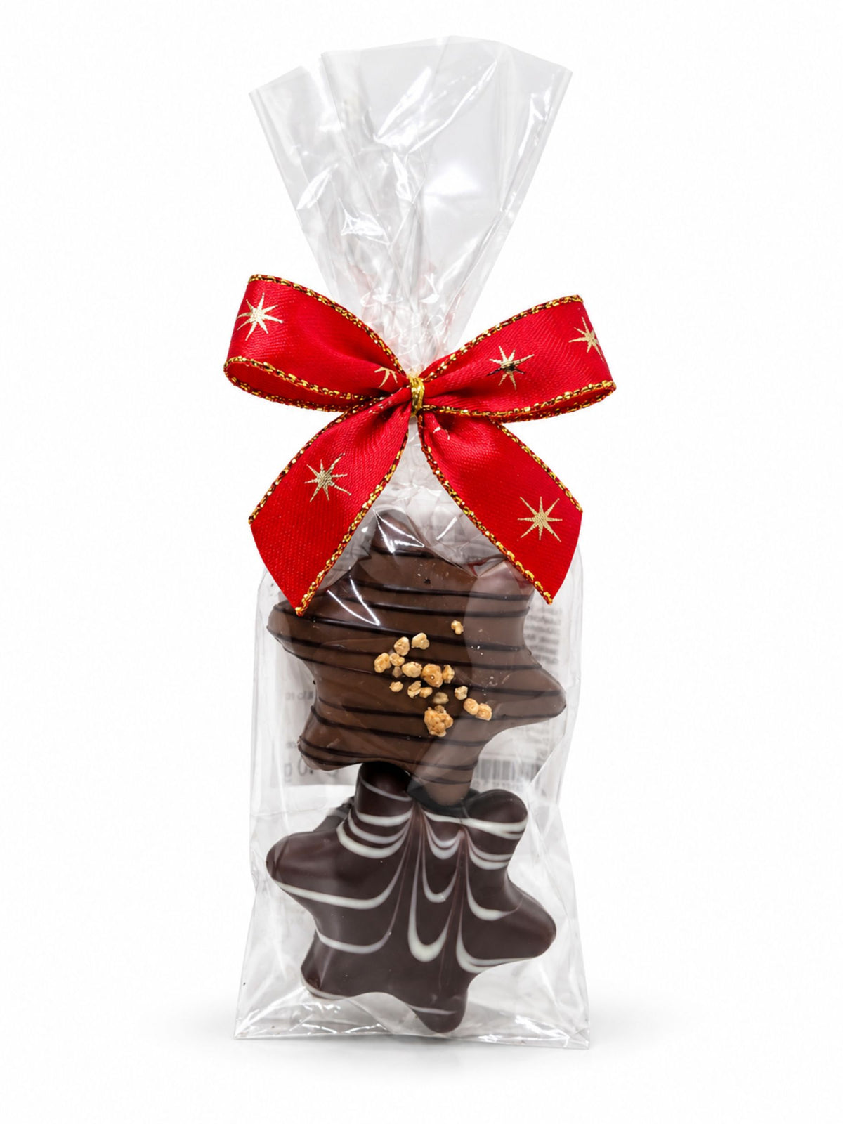 Maxi-Trüffelstern Duo Crème Brûlée und Honig 40g von Wagner Pralinen mit zwei Schokoladensternen in transparenter Geschenkfolie und roter Weihnachtsschleife