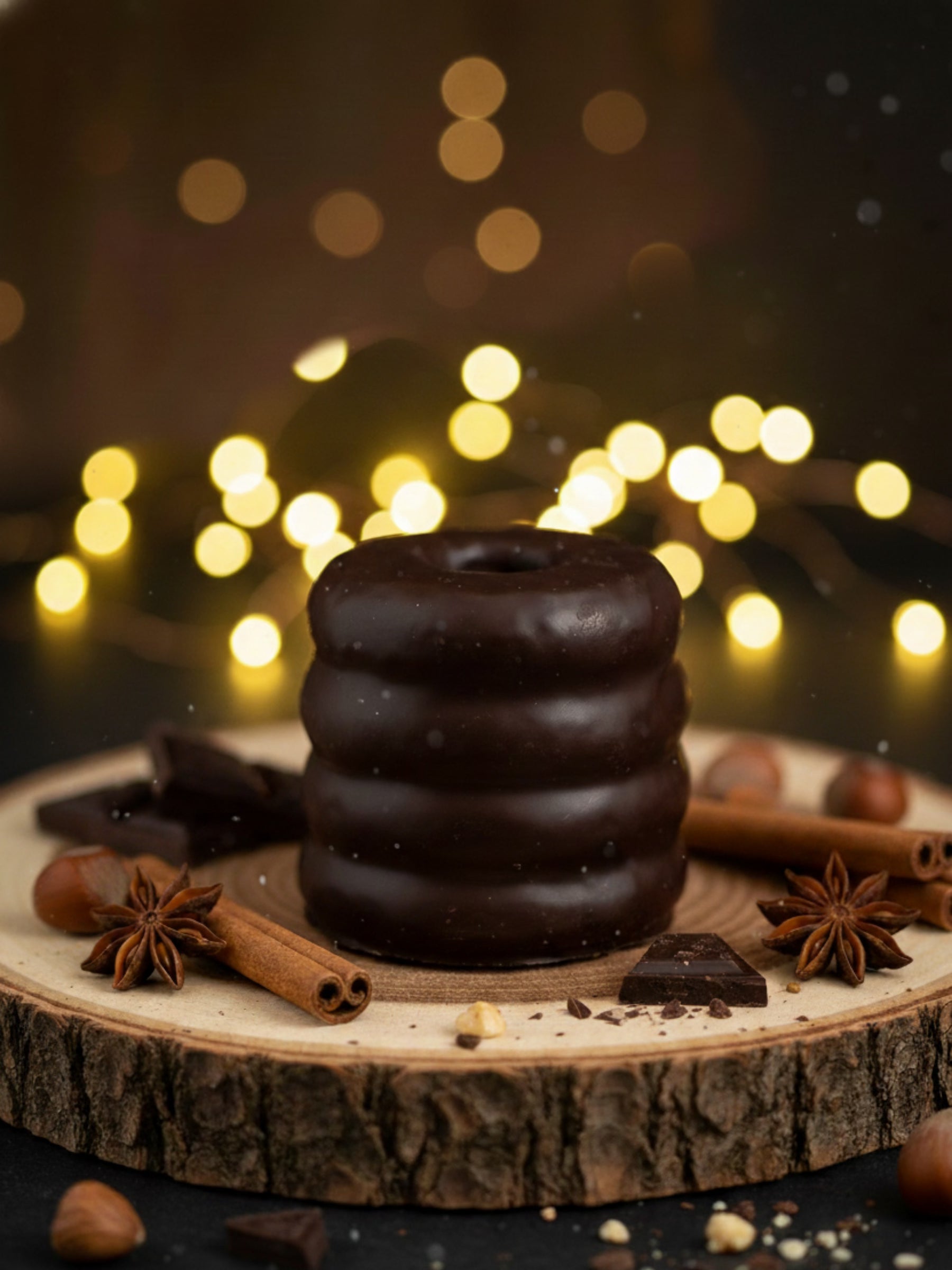 Mini-Baumkuchen Zartbitter 80g – saftiger, ringförmiger Baumkuchen mit edler Zartbitterkuvertüre, hergestellt für die Dreyer Confiserie in der Rattenfängerstadt Hameln.