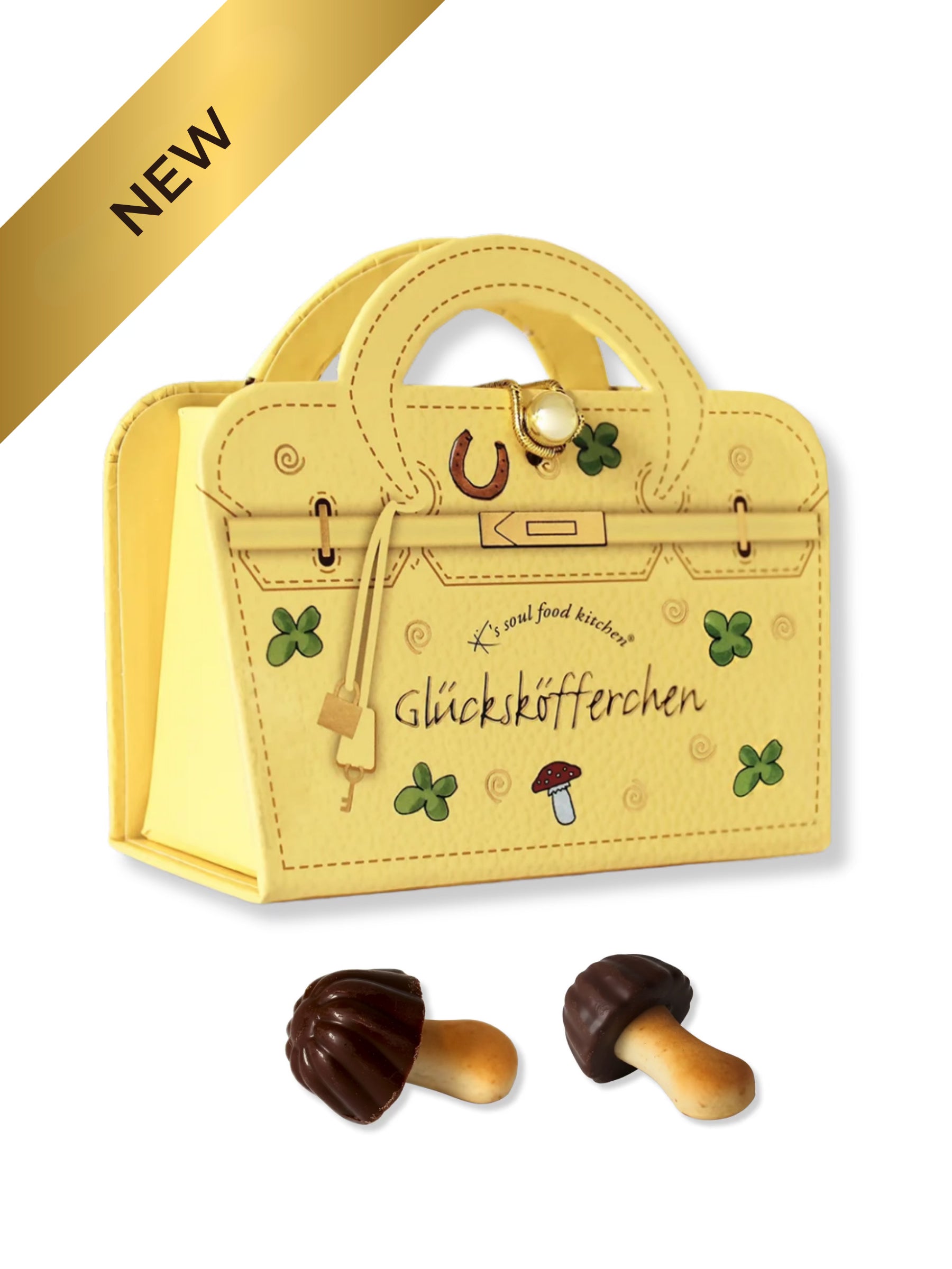K’s Soul Food Kitchen® Glücksköfferchen 16g: süße Grußbotschaft mit Glückspilz-Keksen aus Keks und Vollmilch-Schokolade, erhältlich in der Dreyer Confiserie in der Rattenfängerstadt Hameln.