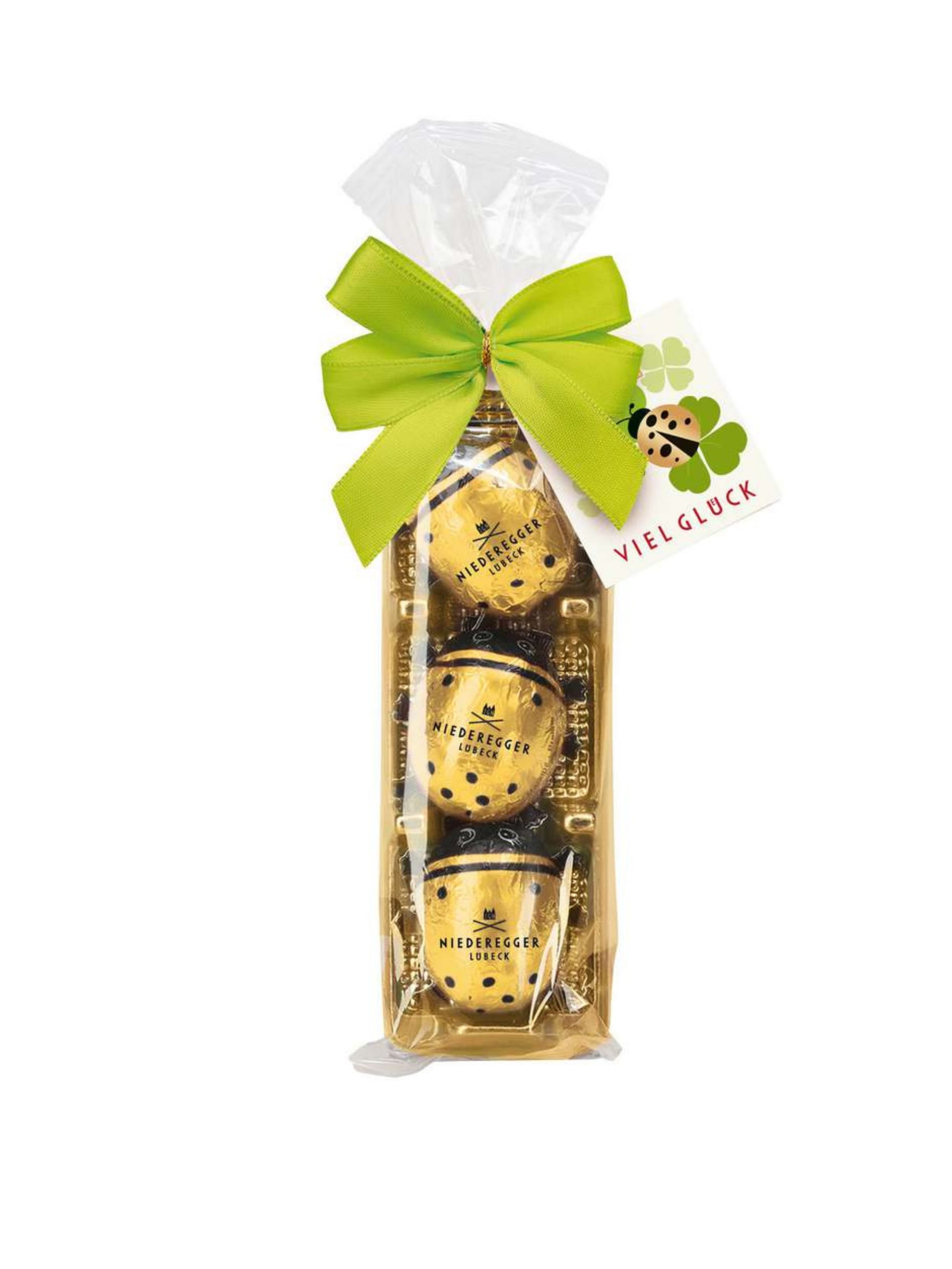 Niederegger Marzipan Glückskäfer mit Schleife 45g aus Marzipan und Vollmilch-Schokolade, dekorativer Glücksbringer mit Kärtchen, erhältlich in der Dreyer Confiserie in der Rattenfängerstadt Hameln.