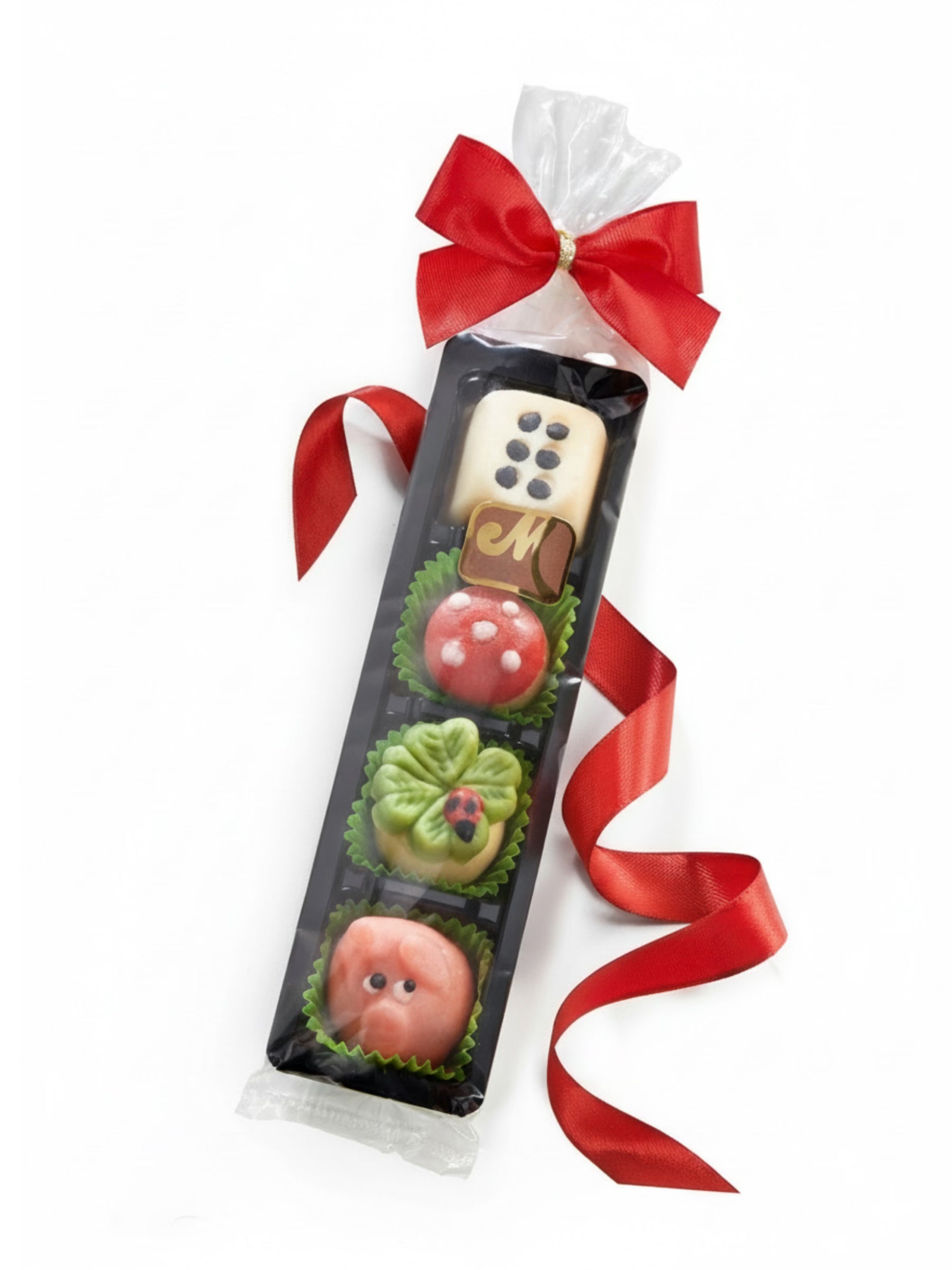 Odenwälder Marzipan-Glücksstange 60g: vier kleine Marzipan-Glücksbringer (Schweinchen, Kleeblatt, Glückspilz, Würfel) aus Edelmarzipan, ideal zum Verschenken zum Jahreswechsel und Silvester, erhältlich in der Dreyer Confiserie in der Rattenfängerstadt Hameln.