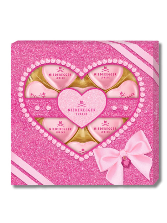 Niederegger Pralinen Herzen Marc de Champagne Glam 125 g – edle Pralinen mit Marc de Champagne Füllung in weißer Schokolade, erhältlich bei Dreyer Confiserie Hameln.