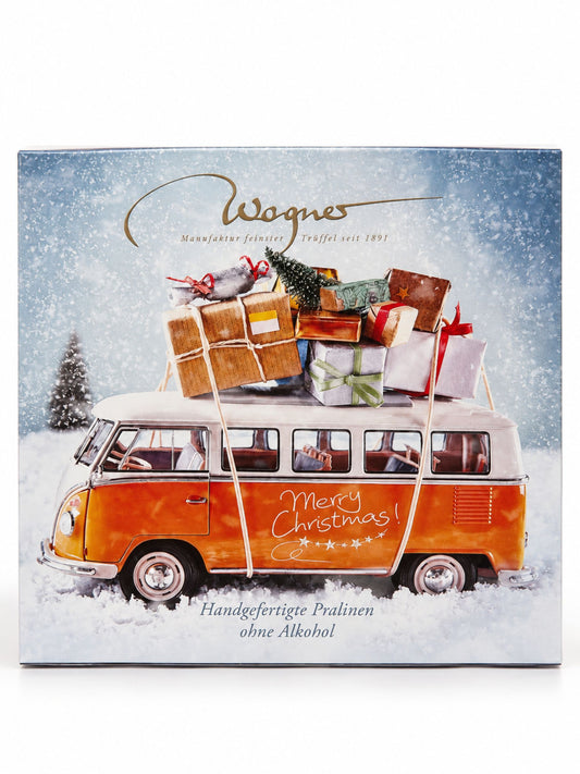 Pralinen ohne Alkohol Merry Christmas Bulli 200g von Wagner Pralinen in weihnachtlicher Geschenkbox mit orangefarbenem Bulli im Schnee und Geschenken auf dem Dach