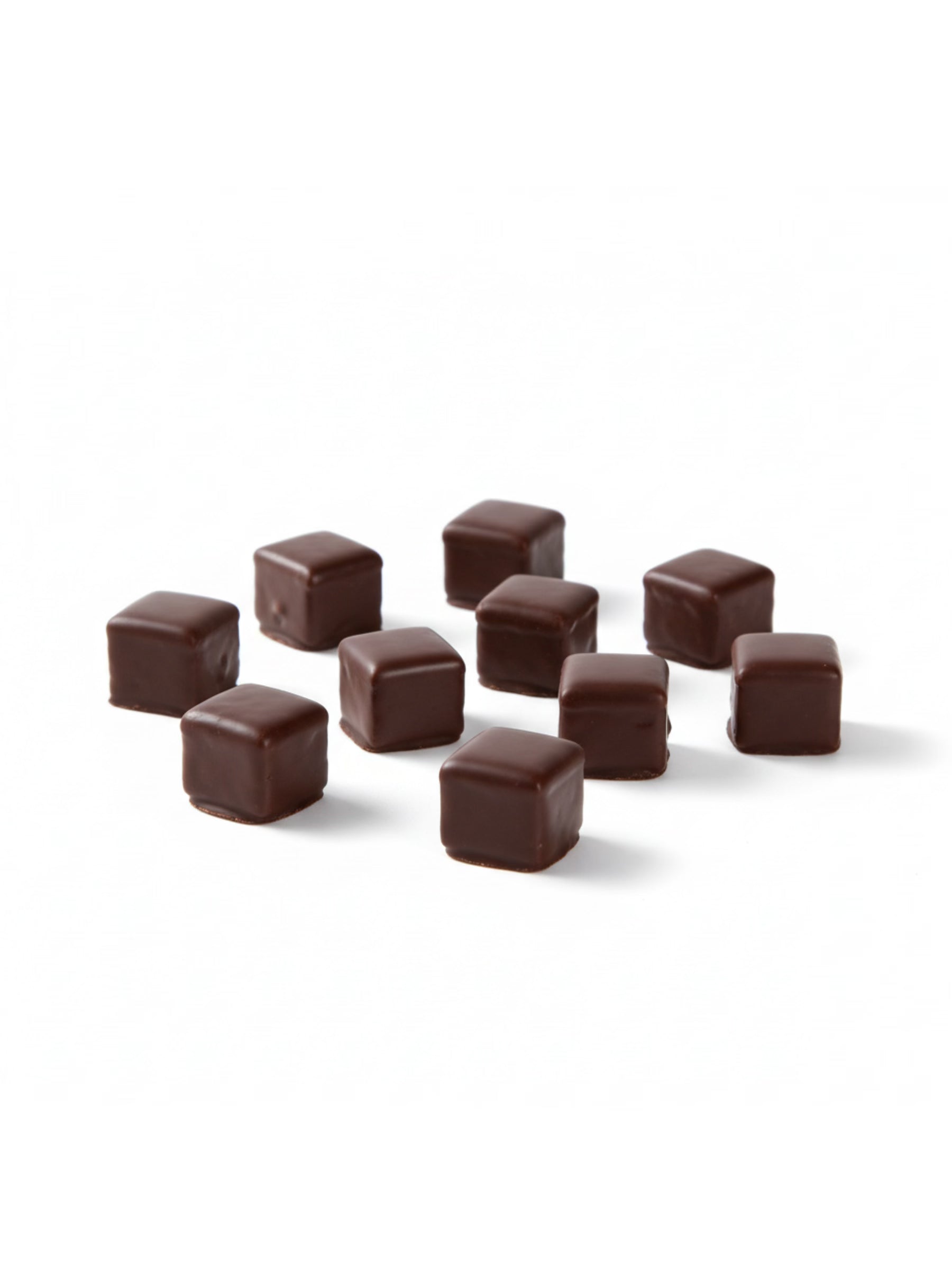 Produktbild von Dominosteine Zartbitter 125 g – fein geschichtetes Weihnachtsgebäck mit Marzipan, Fruchtfüllung und edler Zartbitterschokolade, hergestellt von der Dreyer Confiserie in der Rattenfängerstadt Hameln.