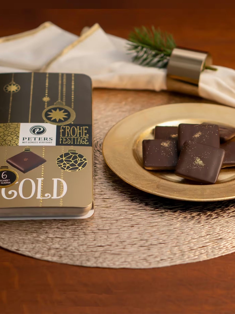 Produktaufnahme von Frohe Festtage 6er Pecarée ® Goldgenuss 63 g von Peters Pralinen.