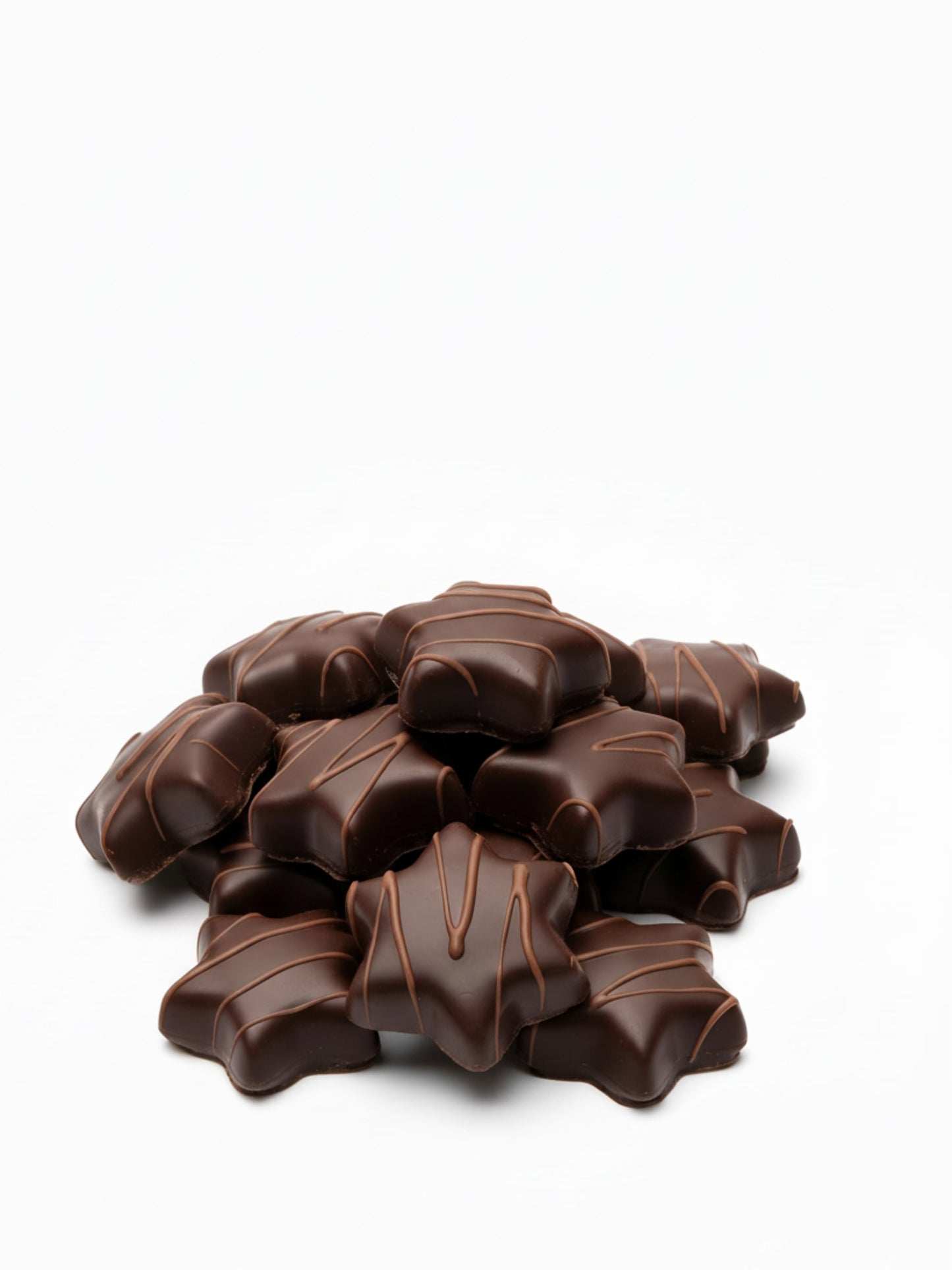 Produktbild von Orangenlikör-Sterne Kruste 100 g – feine Sterne aus Bitterschokolade mit flüssiger Orangenlikör-Füllung, edel verpackt, erhältlich in der Dreyer Confiserie in der Rattenfängerstadt Hameln.