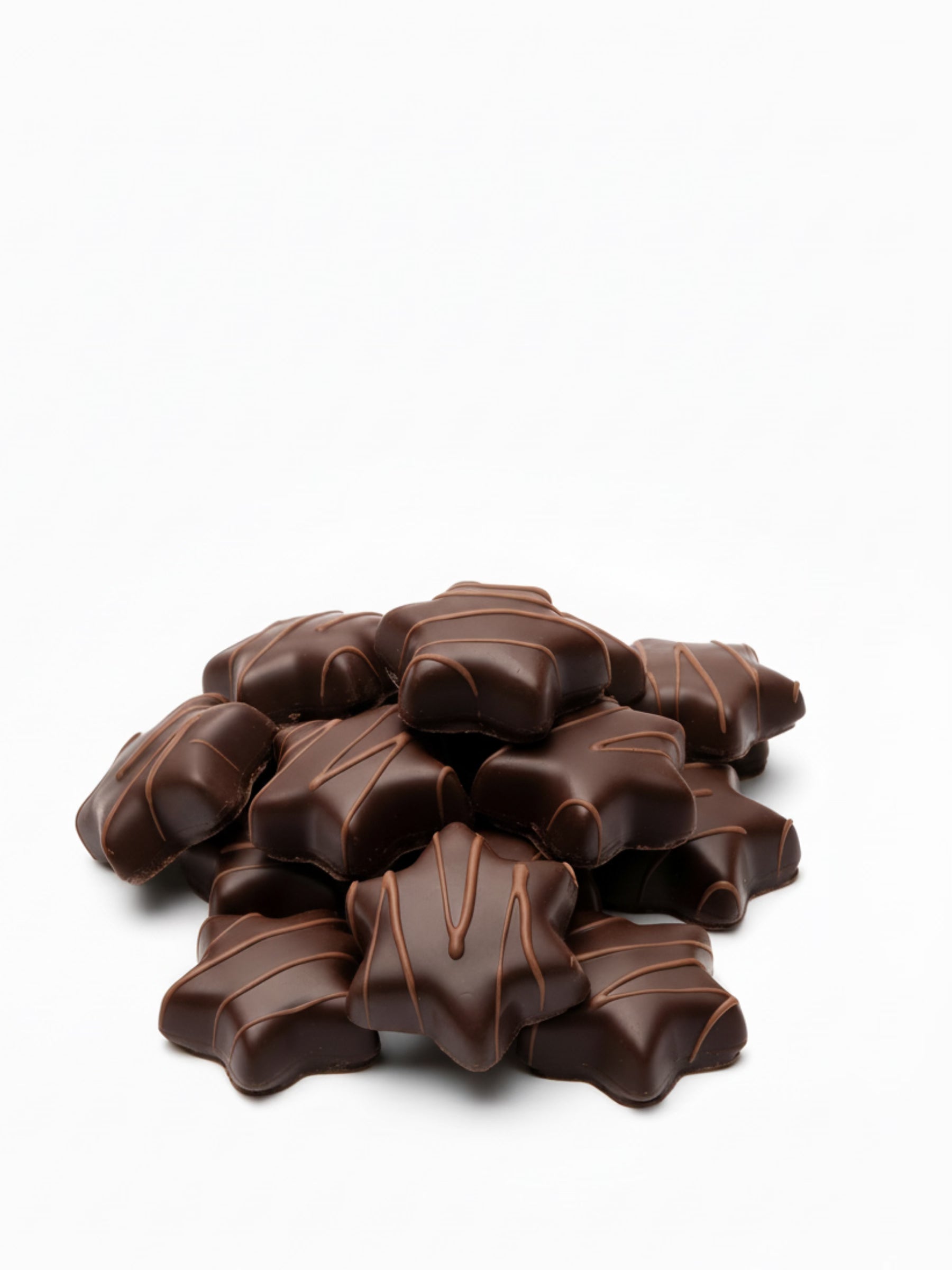 Produktbild von Orangenlikör-Sterne Kruste 100 g – feine Sterne aus Bitterschokolade mit flüssiger Orangenlikör-Füllung, edel verpackt, erhältlich in der Dreyer Confiserie in der Rattenfängerstadt Hameln.