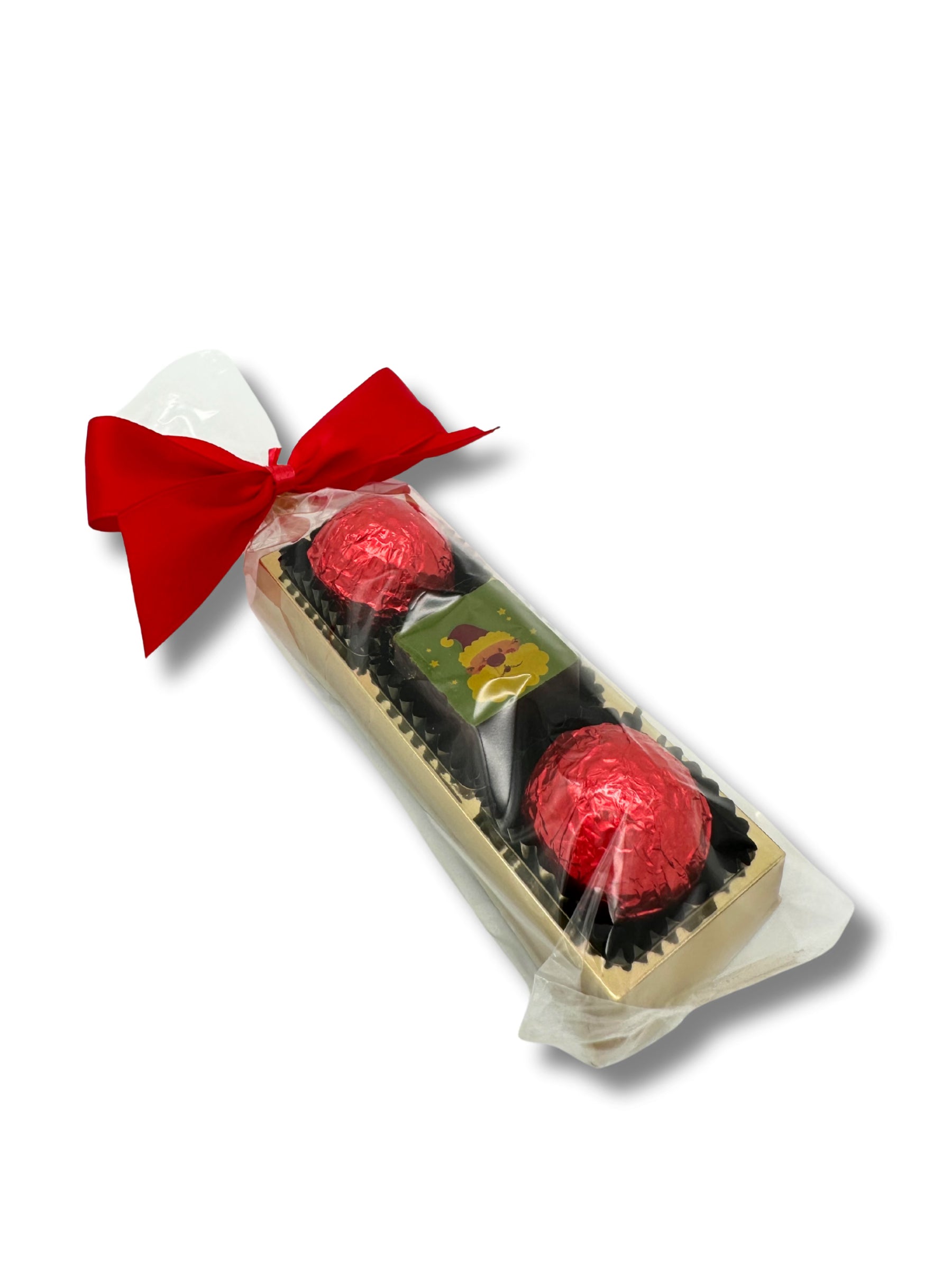 Bestecktasche „Nikolaus“ 37,5 g – weihnachtliche Pralinenmischung ohne Alkohol in Geschenkverpackung „Winter in der Rattenfängerstadt“, erhältlich in der Dreyer Confiserie in Hameln.