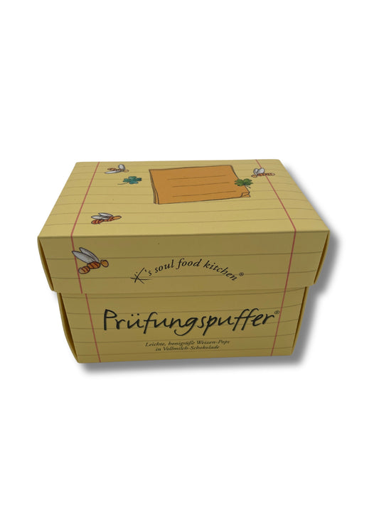 Prüfungspuffer von K’s Soul Food Kitchen – Weizen-Pops mit Honig in Vollmilchschokolade, 125 g Nervennahrung für Prüfungen, erhältlich bei der Confiserie Dreyer in Hameln.