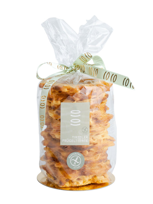 Tiroler Prügeltorte Midi glutenfrei in Folie 290g, handgefertigte glutenfreie Prügeltorte aus traditioneller Tiroler Handarbeit, erhältlich in der Dreyer Confiserie in der Rattenfängerstadt Hameln.