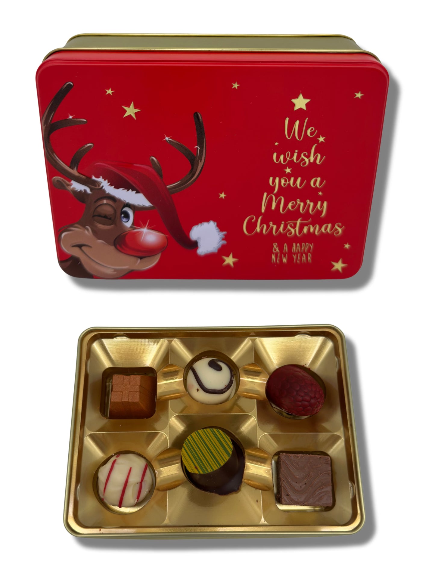 Präsentdose „We wish you a merry Christmas“ 75 g – handgefertigte Pralinen- und Trüffelmischung in goldfarbener Geschenkdose mit Weihnachtsmotiv, erhältlich bei der Dreyer Confiserie in Hameln.