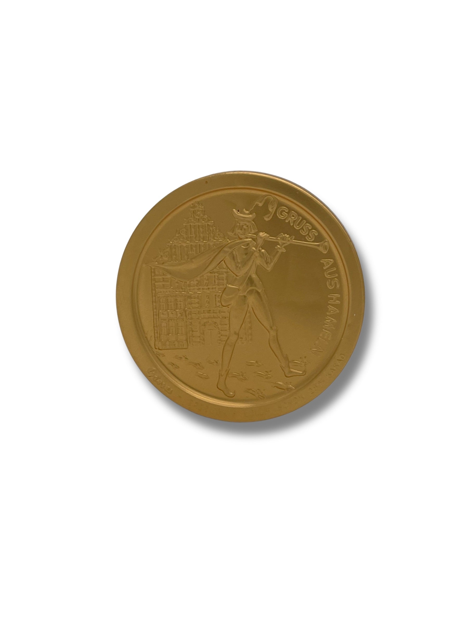 Souvenir Schokoladentaler mit Rattenfänger-Motiv aus Hameln – goldverpackte Vollmilchschokolade.