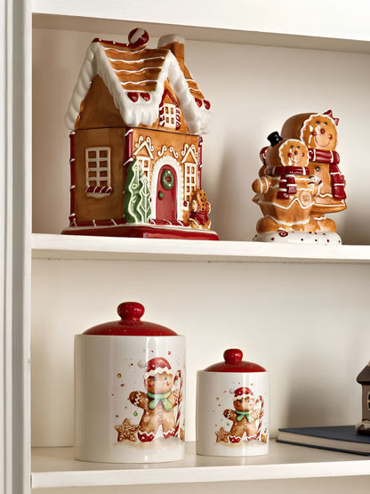 Verkaufsbild von Weihnachtliche weiße Keramikdose mit Lebkuchenfigur und rotem Deckel von G. Wurm in Schrank
