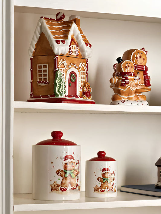 Verkaufsbild von Weihnachtliche weiße Keramikdose mit Lebkuchenfigur und rotem Deckel von G. Wurm in Schrank
