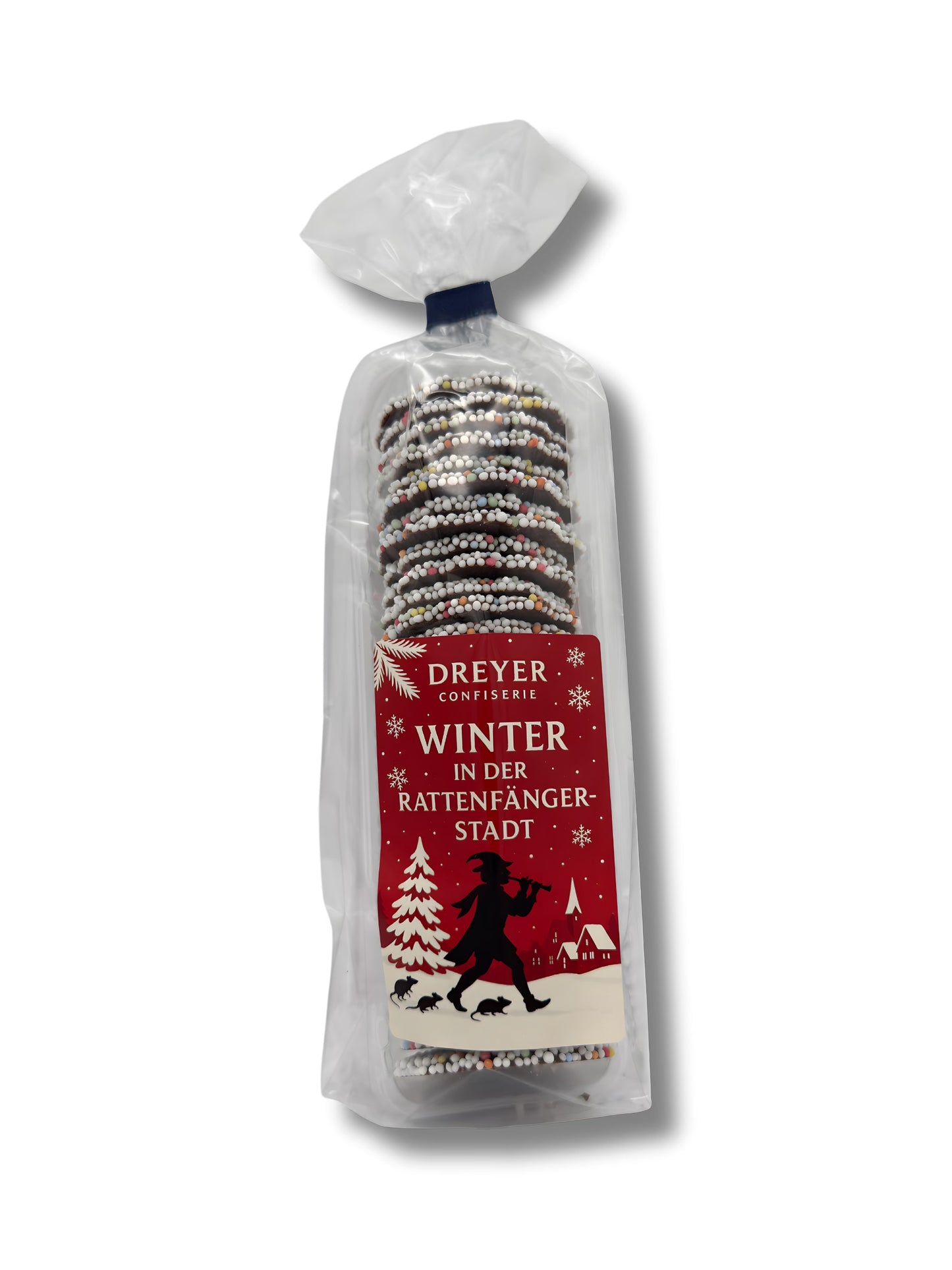 Verpackung von 
Schokokränze mit Nonpareille 200 g – klassische Schokoladenringe mit bunten Zuckerperlen, handverpackt von der Dreyer Confiserie in der Rattenfängerstadt Hameln.