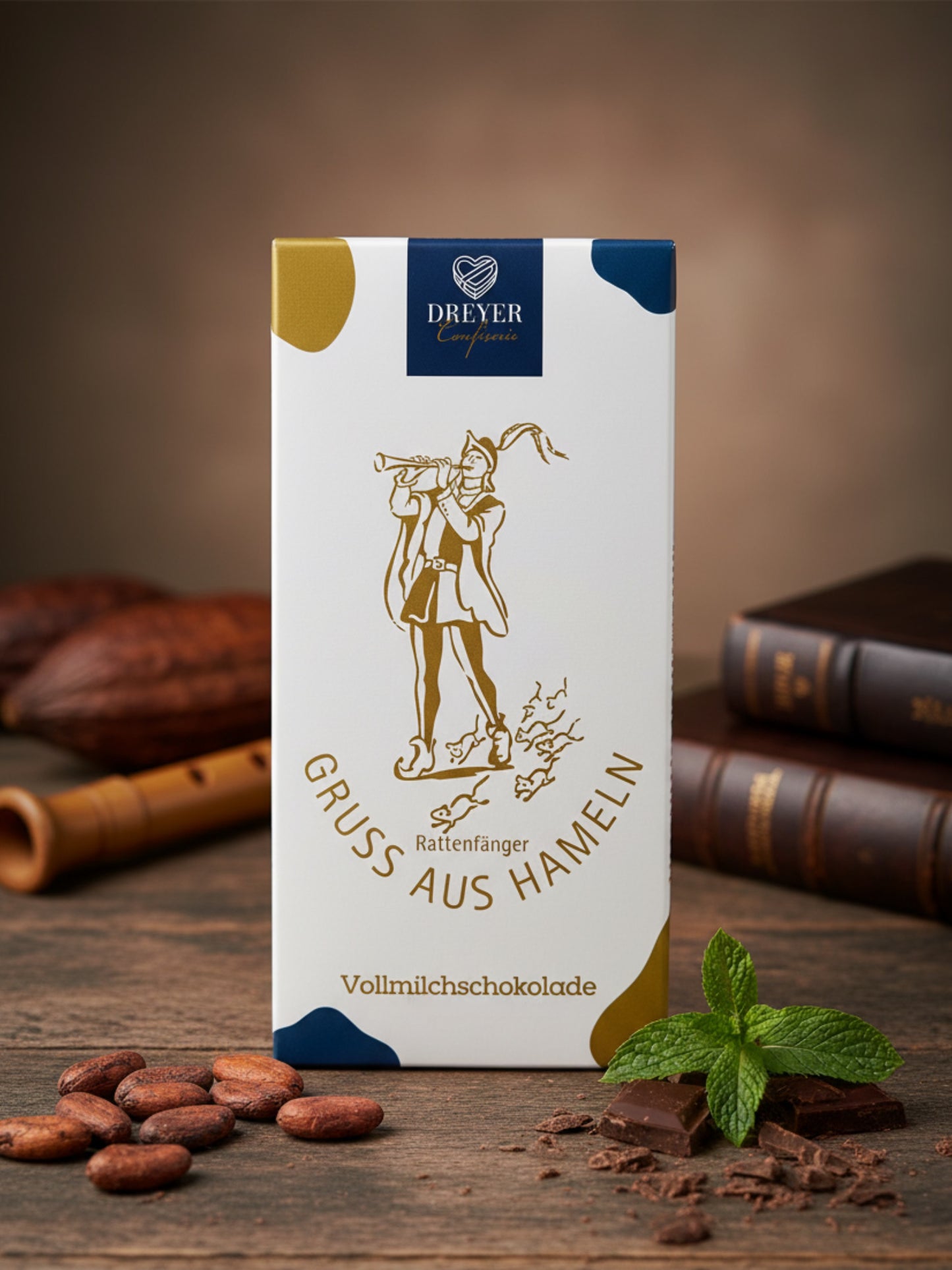 Schokolade „Gruß aus Hameln“ Vollmilch 80 g – feine Vollmilchschokolade mit Motiv der Rattenfängerstadt Hameln, handgefertigt für die Dreyer Confiserie.